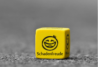 A Die With Smiley Faces