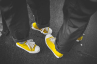 Two People In Yellow Converse